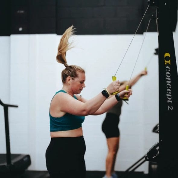 woman doing ski erg