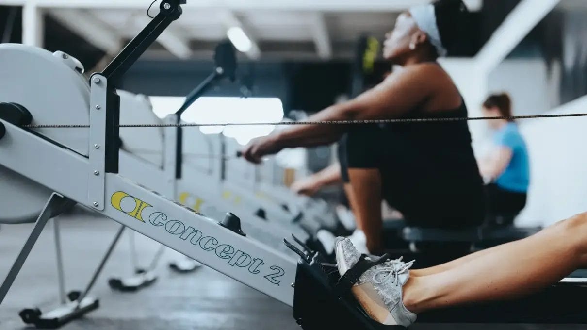 Women working out on rower